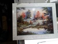 A boy and girl by the pond